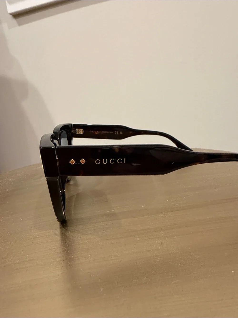 Gucci Sunglasses with dark Havana frame and blue lenses